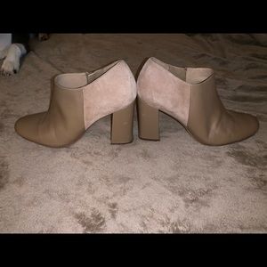 Woman’s booties roughly around a size 8
